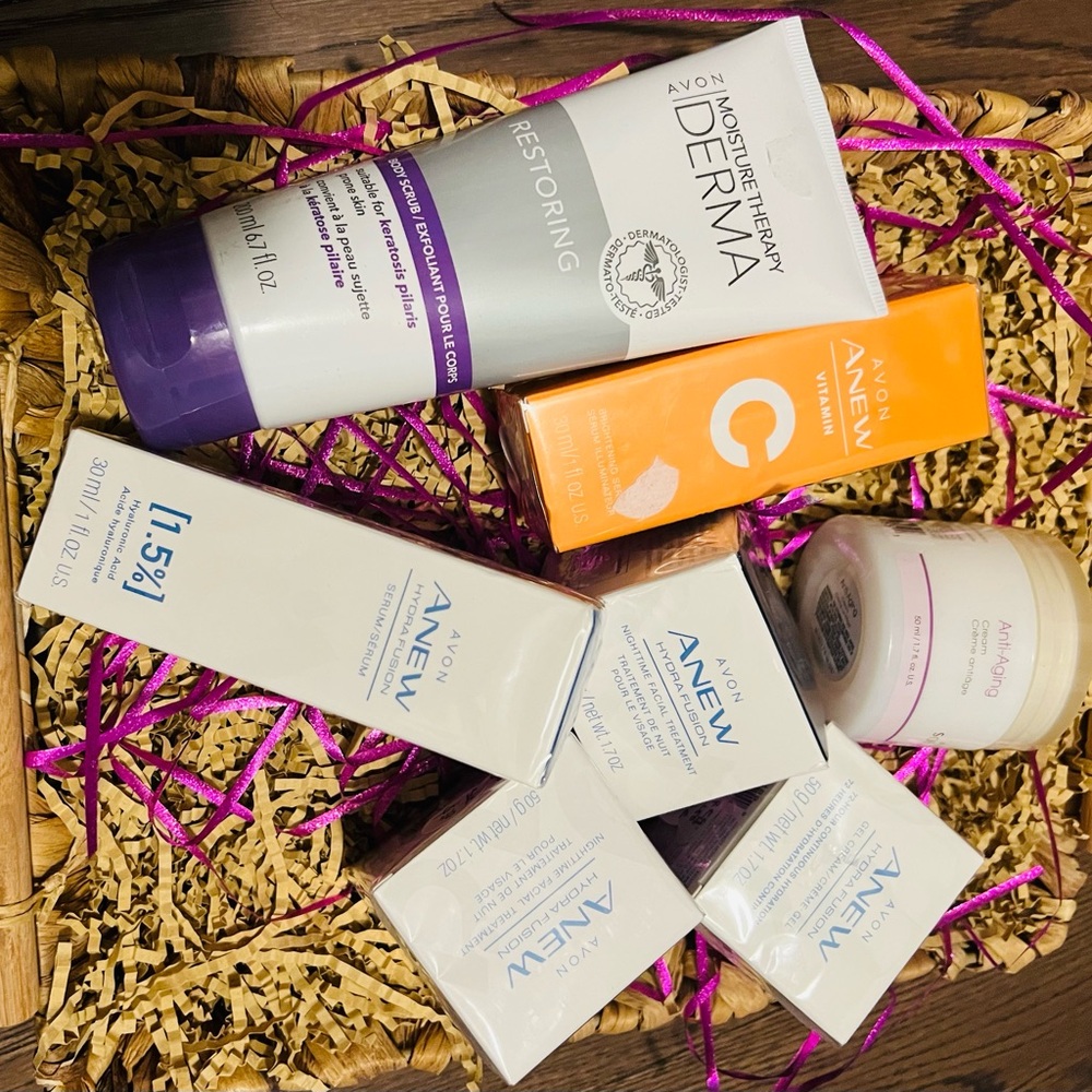 Avon Skincare Set with Purple and Orange Accents